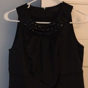 Sleeveless black dress. Never worn
